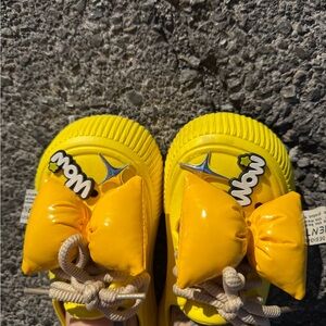 Vibrant Yellow Women's Slippers with Bow Detail